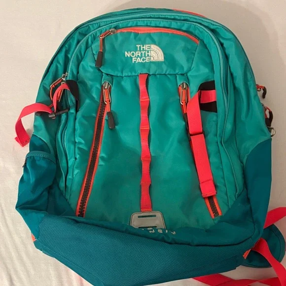 The North Face Turquoise and Orange Backpack - Surge II Transit The North Face Surge II Review: the Backpack I Wish I Always  main image 3